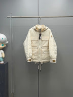 Light beige Moncler long hooded jacket with front zipper and snap pockets