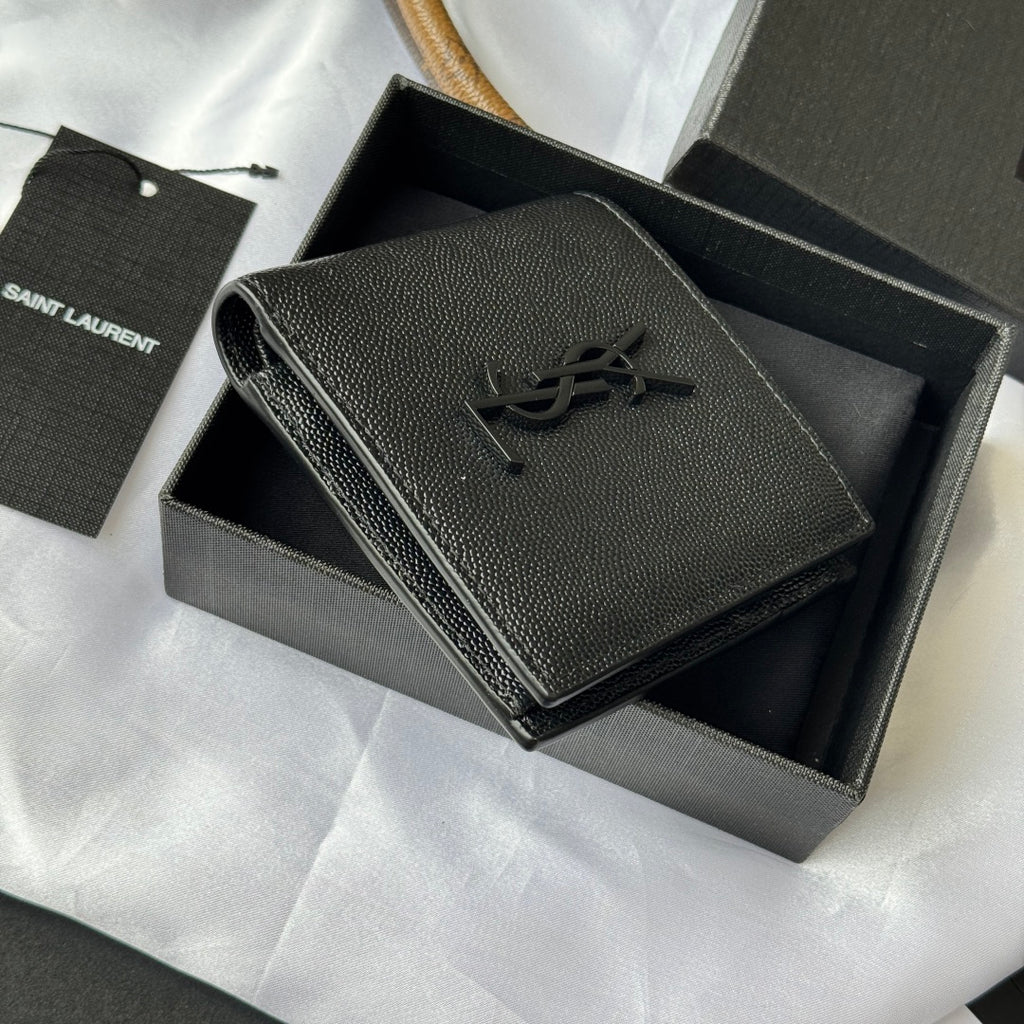Small leather bag with textured exterior, YSL logo, and side zipper trim