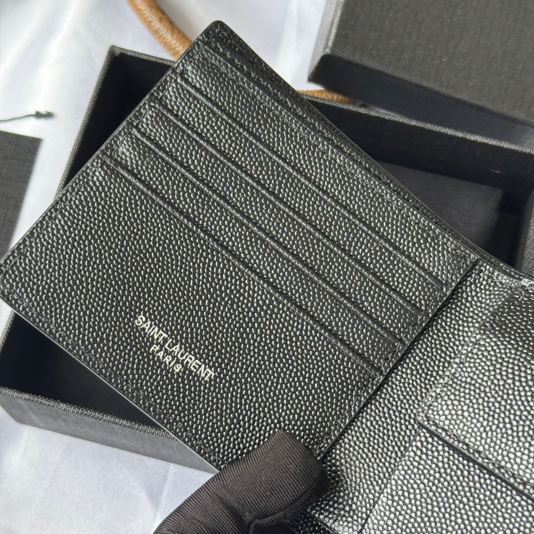 Small leather card case interior with multiple slots and YSL branding