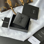 Small leather bag with textured finish and YSL logo plaque on the front
