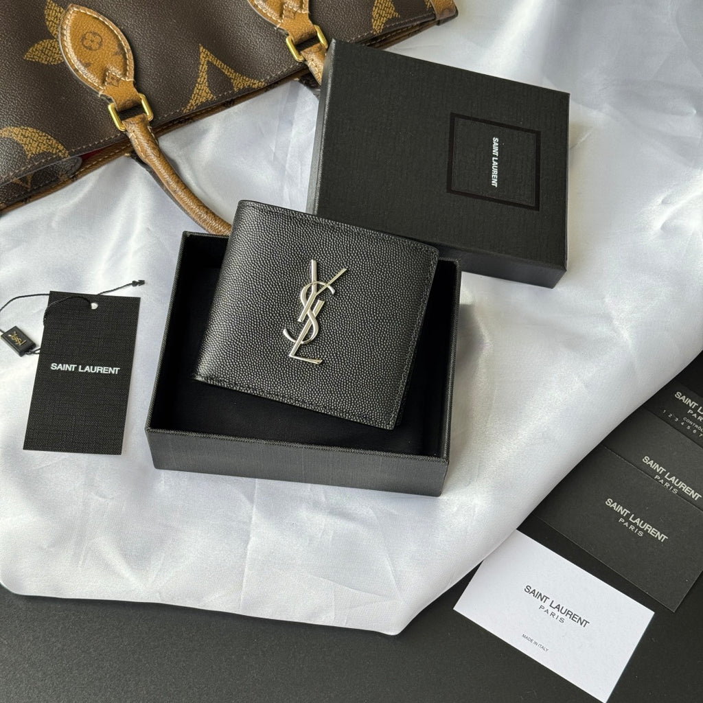 Black textured small leather bag with YSL logo on front, in gift box