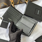 Black textured small leather card holder with multiple card slots, open