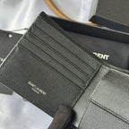 Black textured leather card holder interior with stitched card compartments