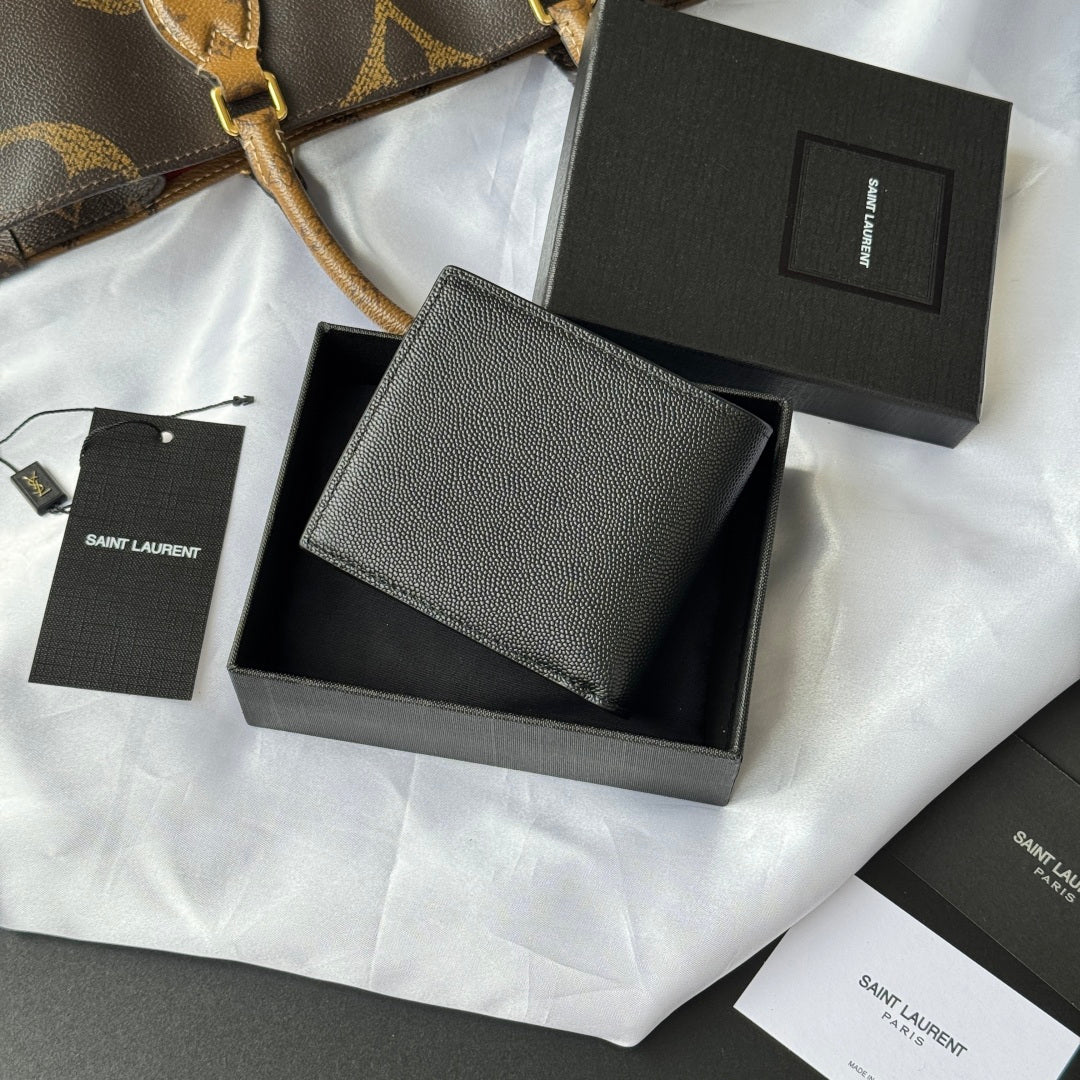 Black textured small leather bag in box, flat front panel