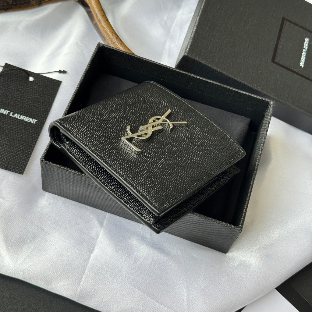 Black textured small leather bag with gold YSL signature on front flap