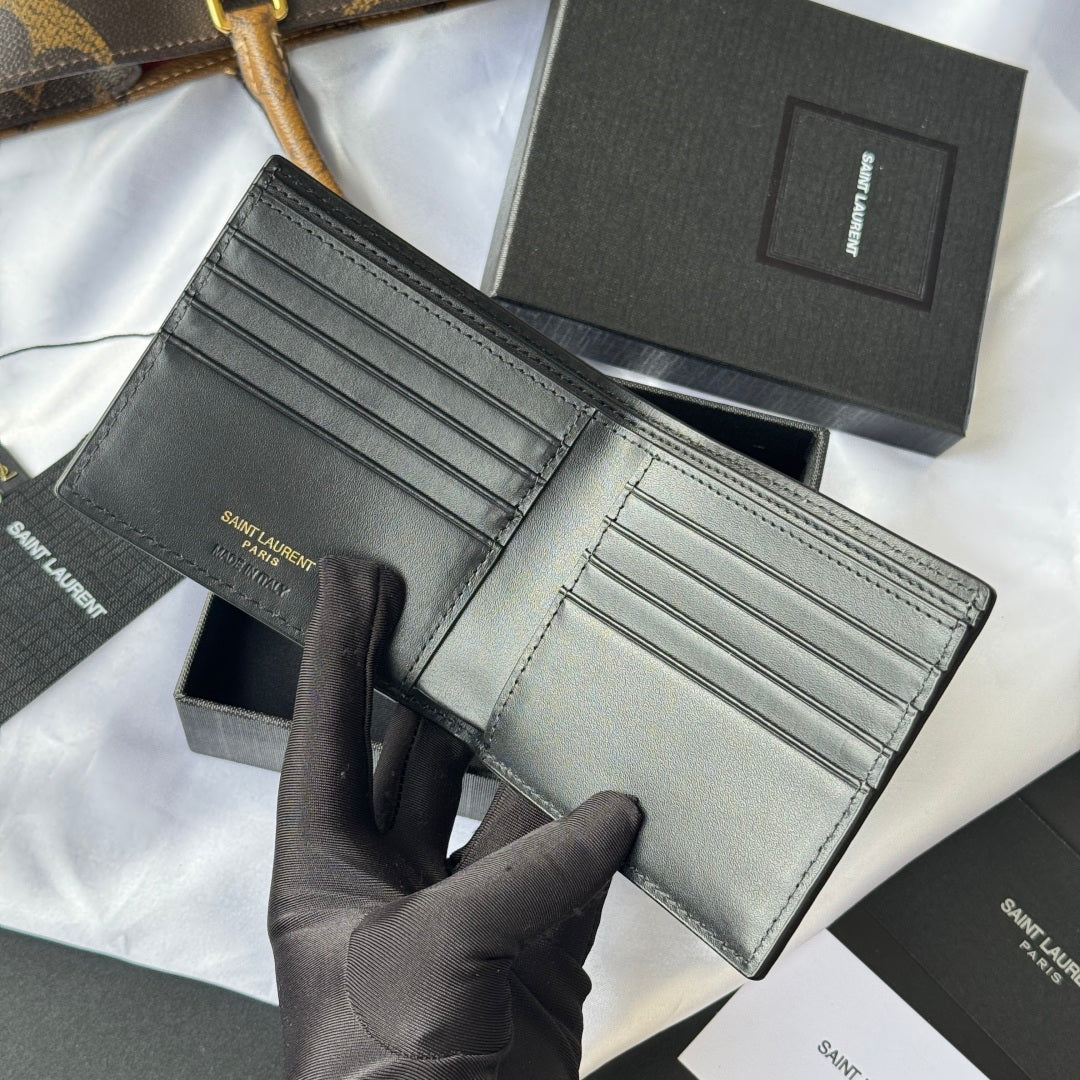 Small leather card case interior with multiple card slots and logo panel