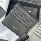 Small leather card case with card slots and stitched edges, logo on inner panel