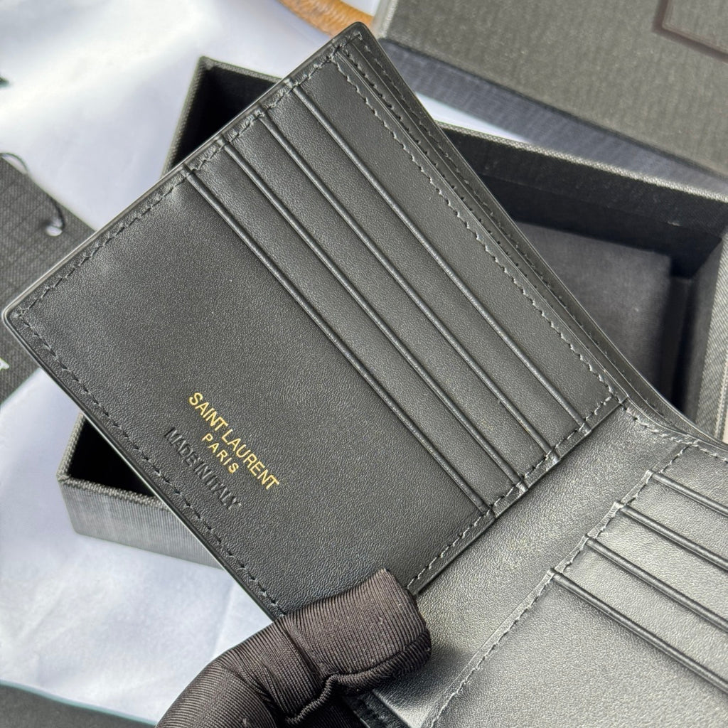 Small bag wallet interior close-up, card slots with Saint Laurent Paris branding