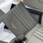 Small bag wallet interior close-up, card slots with Saint Laurent Paris branding