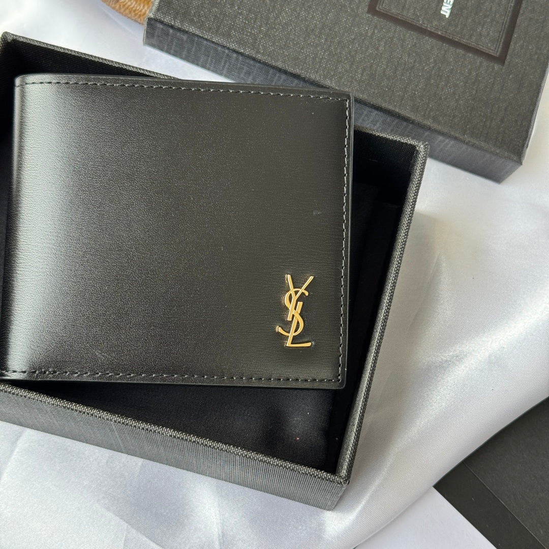 Small bag wallet front close-up, dark finish with gold YSL-style logo and stitching