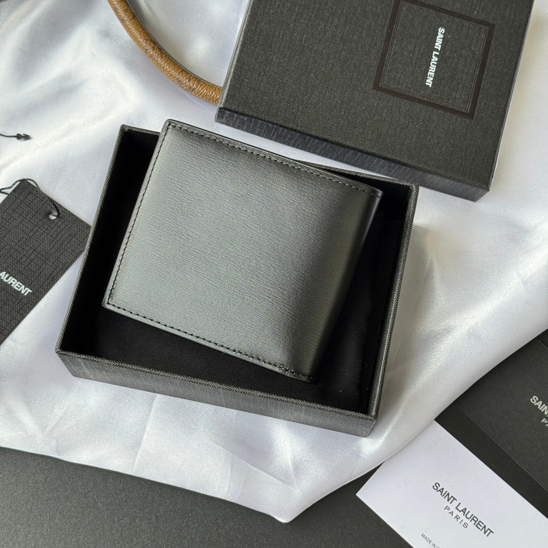 Small bag wallet with light gray exterior, stitched border, and gold YSL-style logo