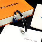 Louis Vuitton bracelet with black enamel band and silver-tone V clasp