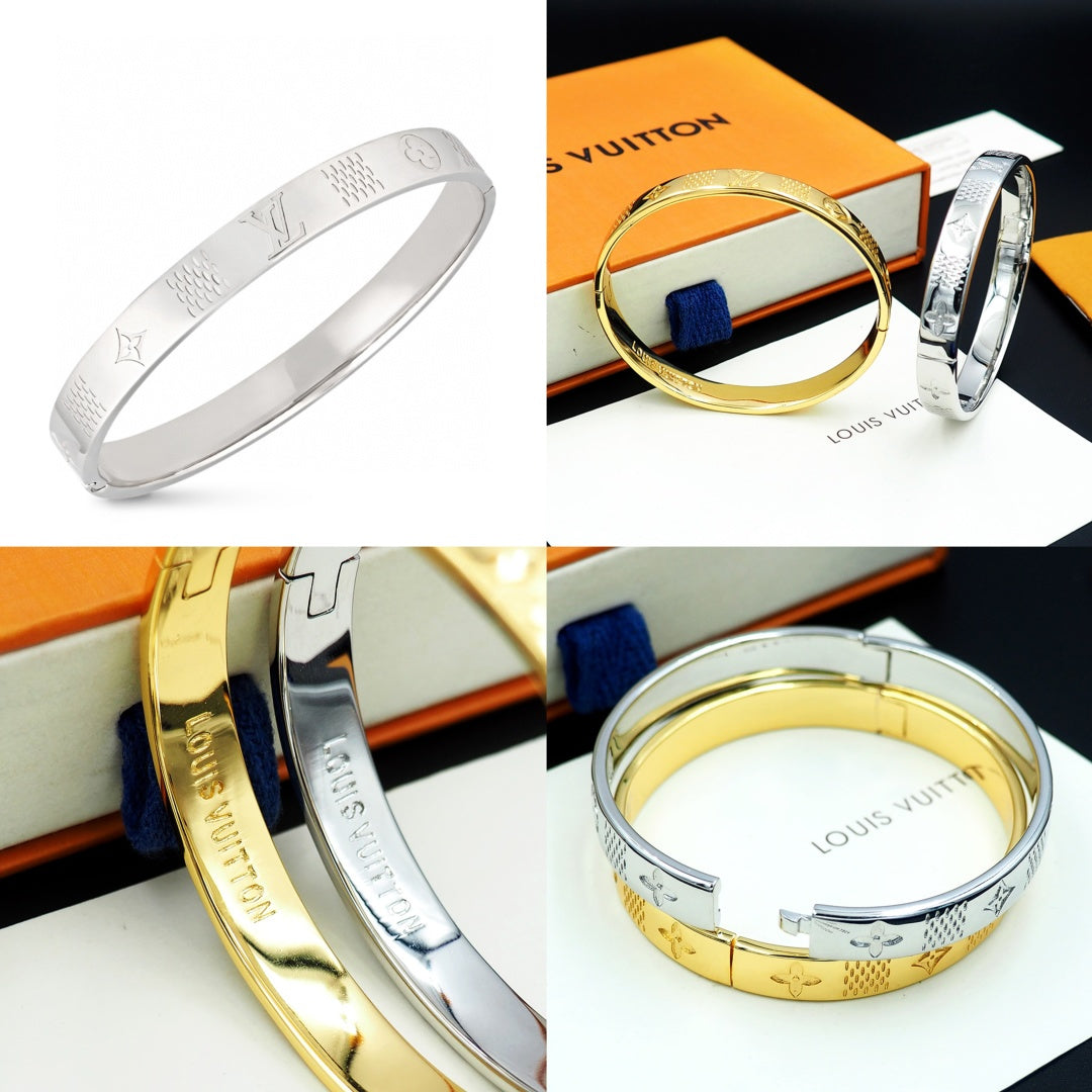 Louis Vuitton engraved silver cuff bracelet with repeating monogram-style pattern