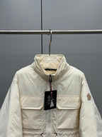 Long puffer jacket in cream with full zip, hood, and side pockets