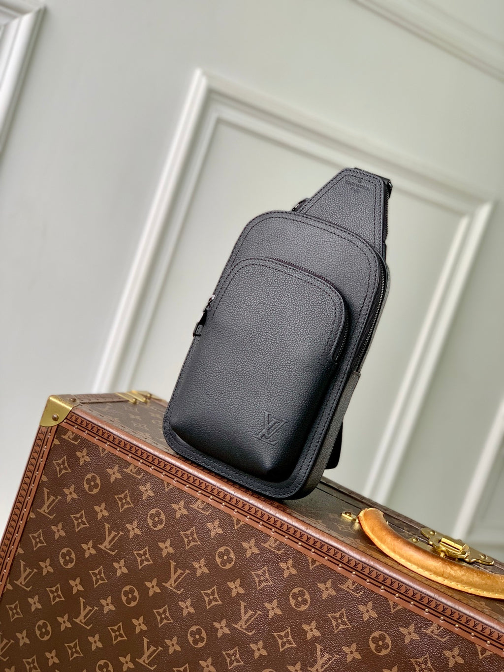Louis Vuitton dark gray leather crossbody bag with front flap and zip pockets