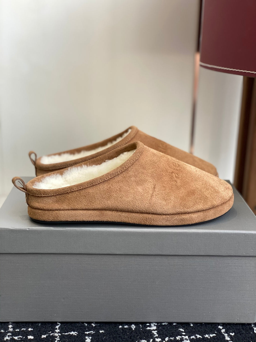 Balenciaga tan suede slide mules with shearling lining, side view