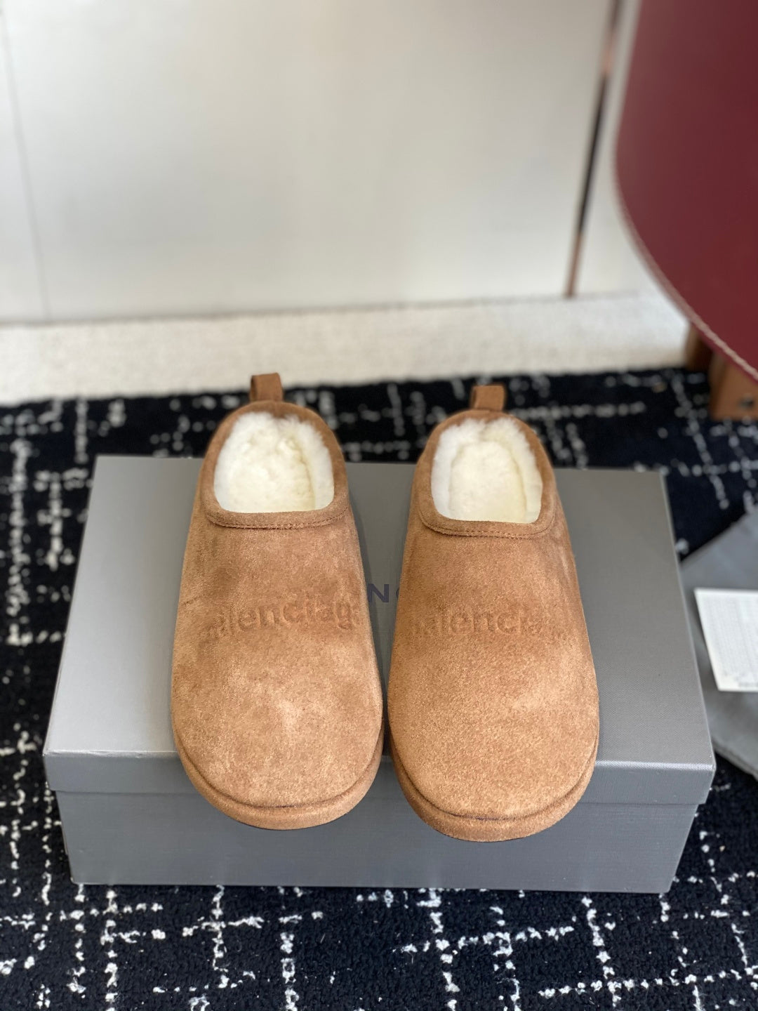 Balenciaga tan suede slip-on mules with shearling lining, front view, pair