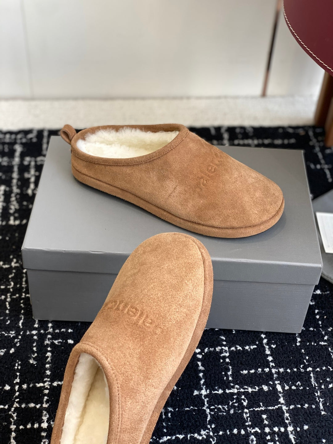 Balenciaga tan suede slip-on mules with shearling lining, side and front view