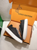 Louis Vuitton high-traction sneakers, black monogram uppers, white zigzag sole