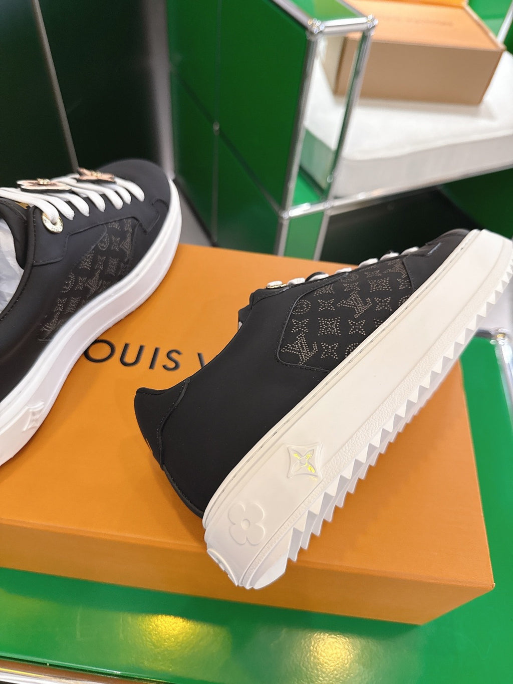 Louis Vuitton low-top sneakers, black monogram canvas, white sole with star stud detail