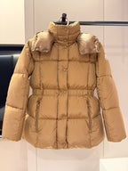 Long beige puffer jacket with hood, front zip, and side pockets