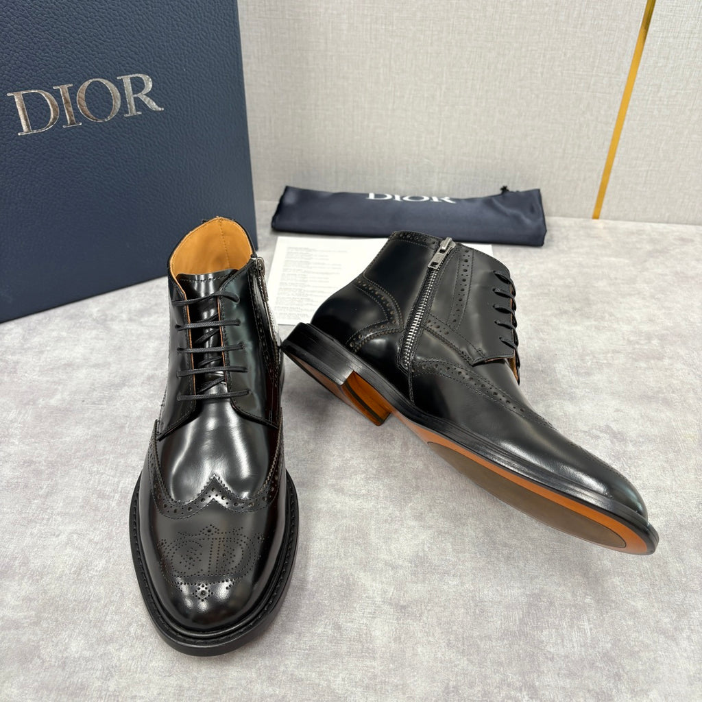 Black leather dress boots with lace-up front, side zipper, and wingtip pattern on toe