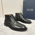 Dior unisex black leather lace-up boots with brogue wingtip perforations and toe cap