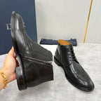 Dior unisex black leather lace-up boots with side zip and brogue wingtip perforations
