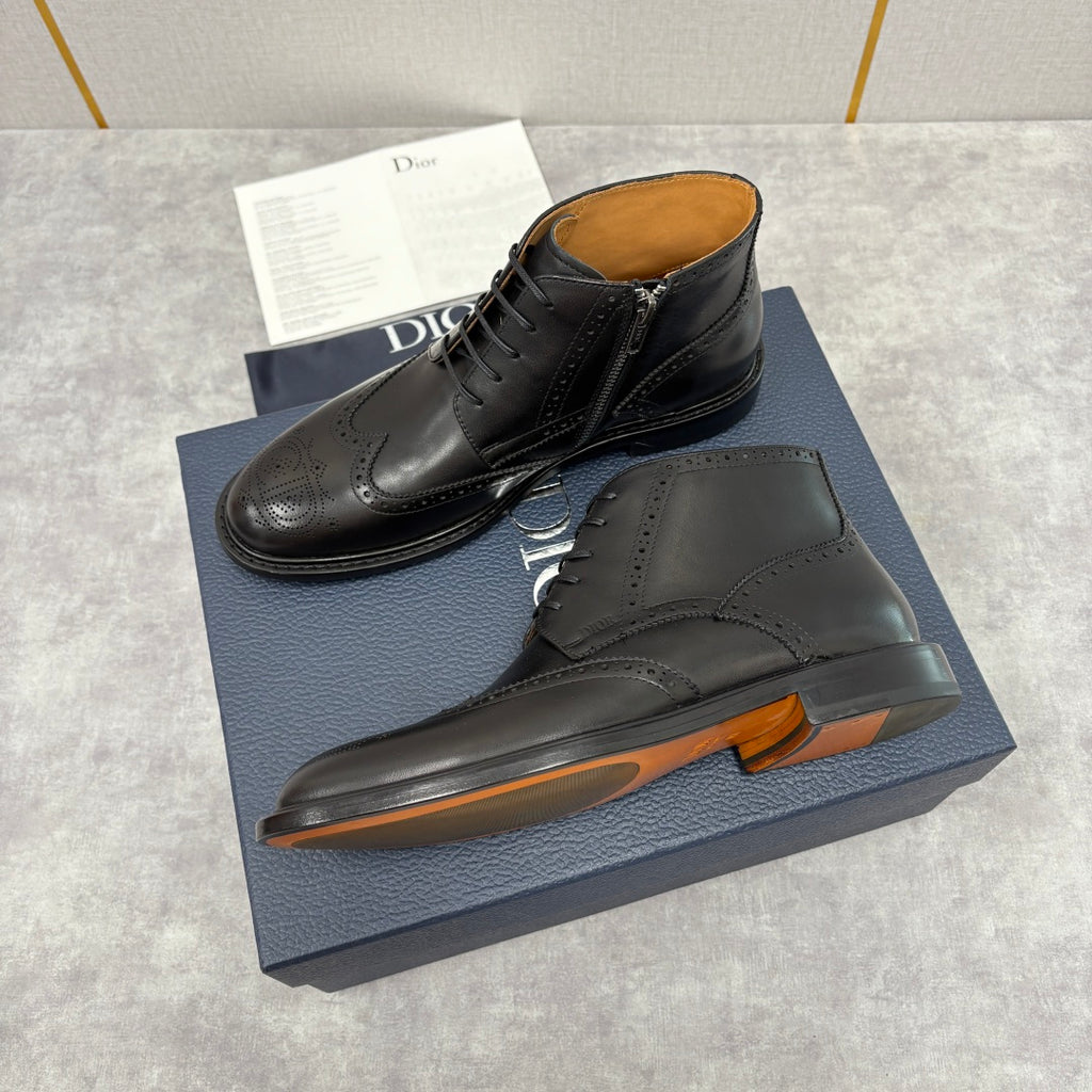 Dior unisex black leather lace-up boots with brogue detailing and chunky sole with orange edge