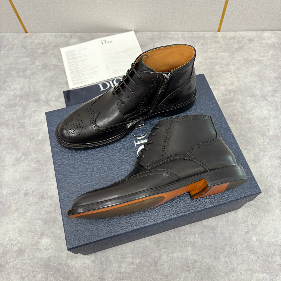 Dior unisex black leather lace-up boots with brogue detailing and chunky sole with orange edge