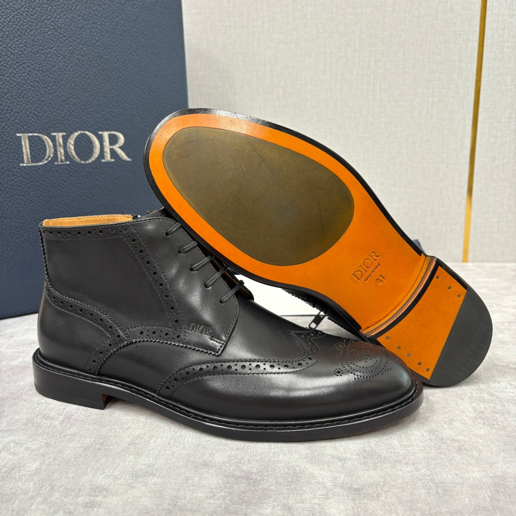 Dior unisex black leather lace-up boots with orange rubber outsole and brogue detailing