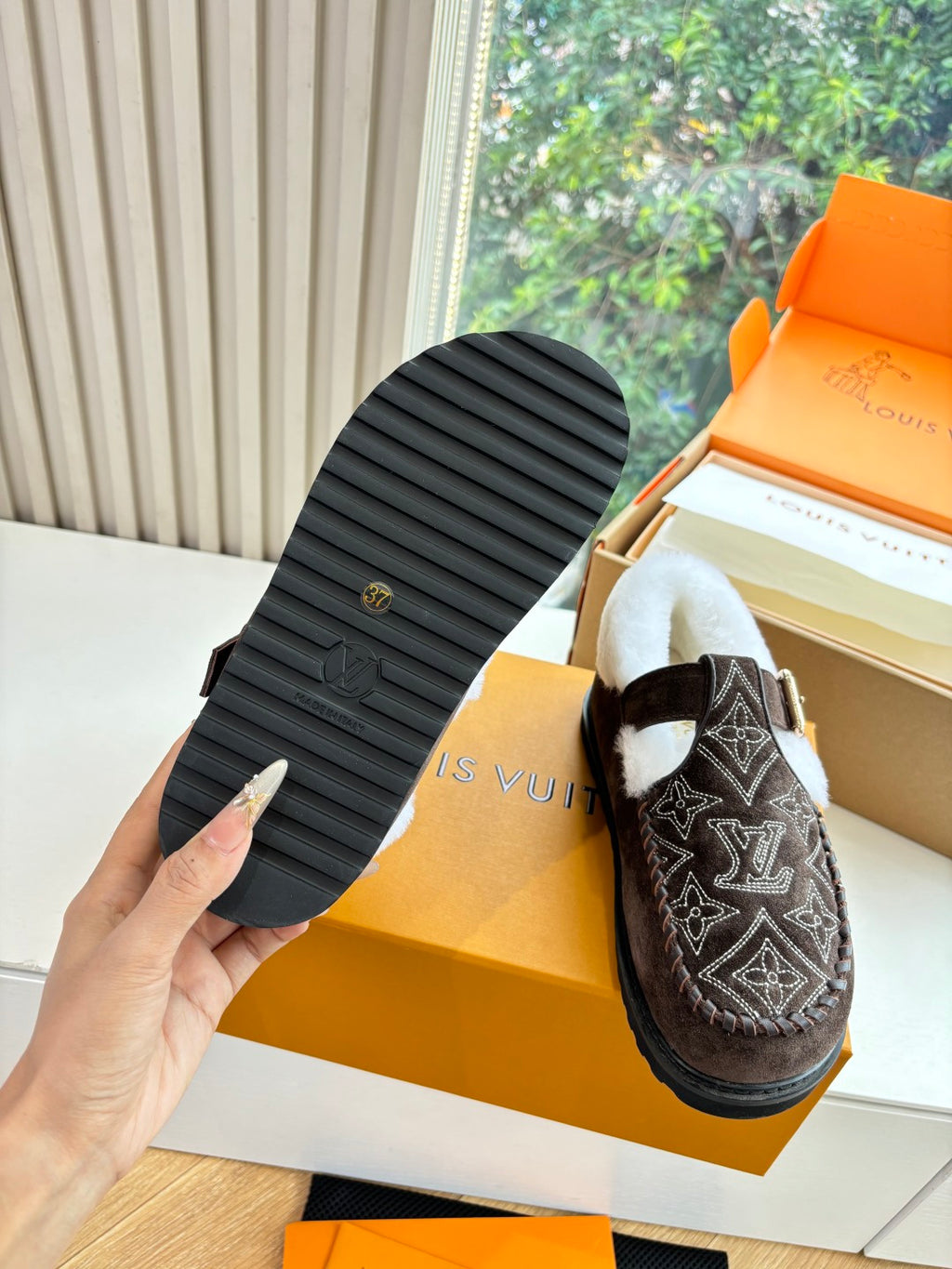 Louis Vuitton slipper outsole with ridged tread and dark rubber sole