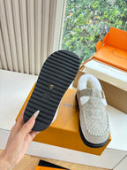 Louis Vuitton unisex shoe outsole with light gray suede upper and shearling lining