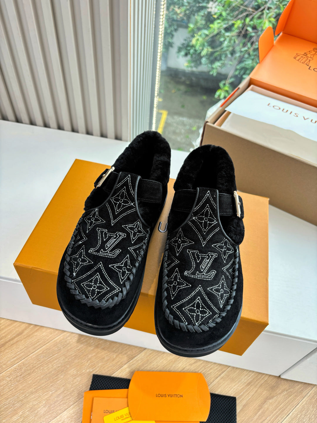 Louis Vuitton unisex suede loafers, black with monogram pattern and adjustable strap