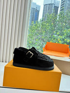 Louis Vuitton unisex suede loafers, black with monogram pattern and buckle