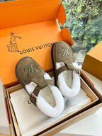 Taupe suede moccasin slip-on with white shearling and LV emblem on side