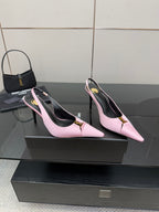 Pair of pink leather pointed-toe slingback heels with gold buckle detail