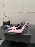 Pink leather pointed-toe slingback pumps with black lining and tall stiletto heel