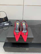 Women’s red pointed-toe slingback heels with YSL gold logo detail
