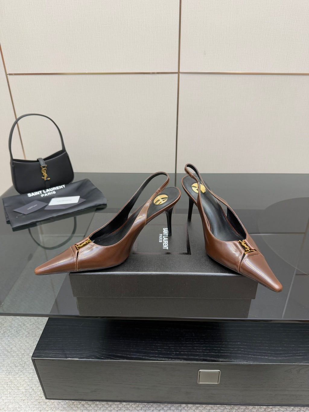 YSL ladies pointed-toe heels on box, brown uppers, gold emblem, slingback