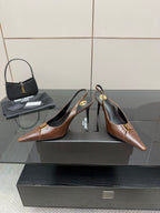 YSL ladies pointed-toe heels on box, brown uppers, gold emblem, slingback