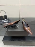 YSL ladies pointed-toe heels, brown slingback with gold emblem, side perspective