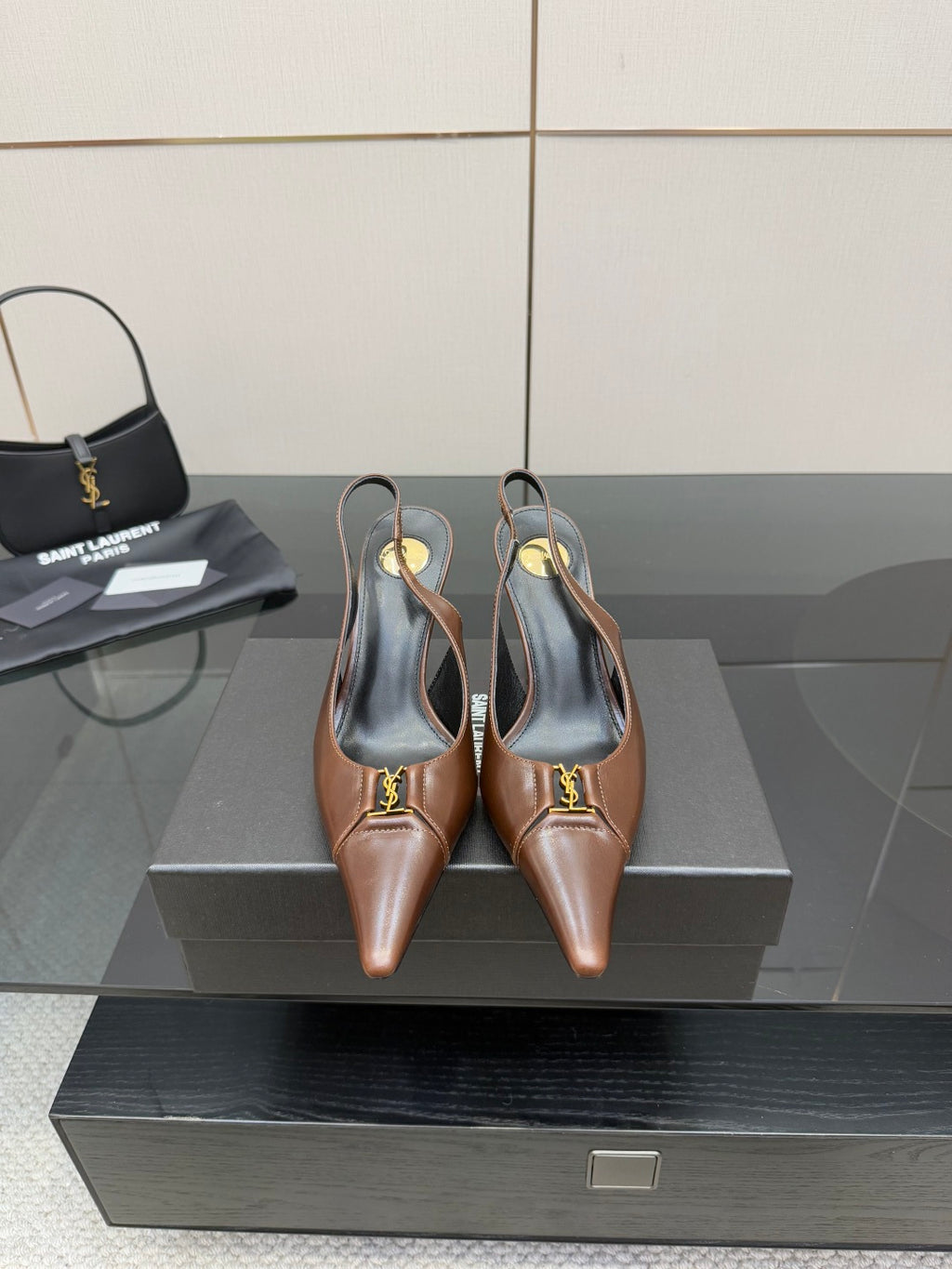 YSL ladies pointed-toe heels, brown with gold emblem, slingback strap