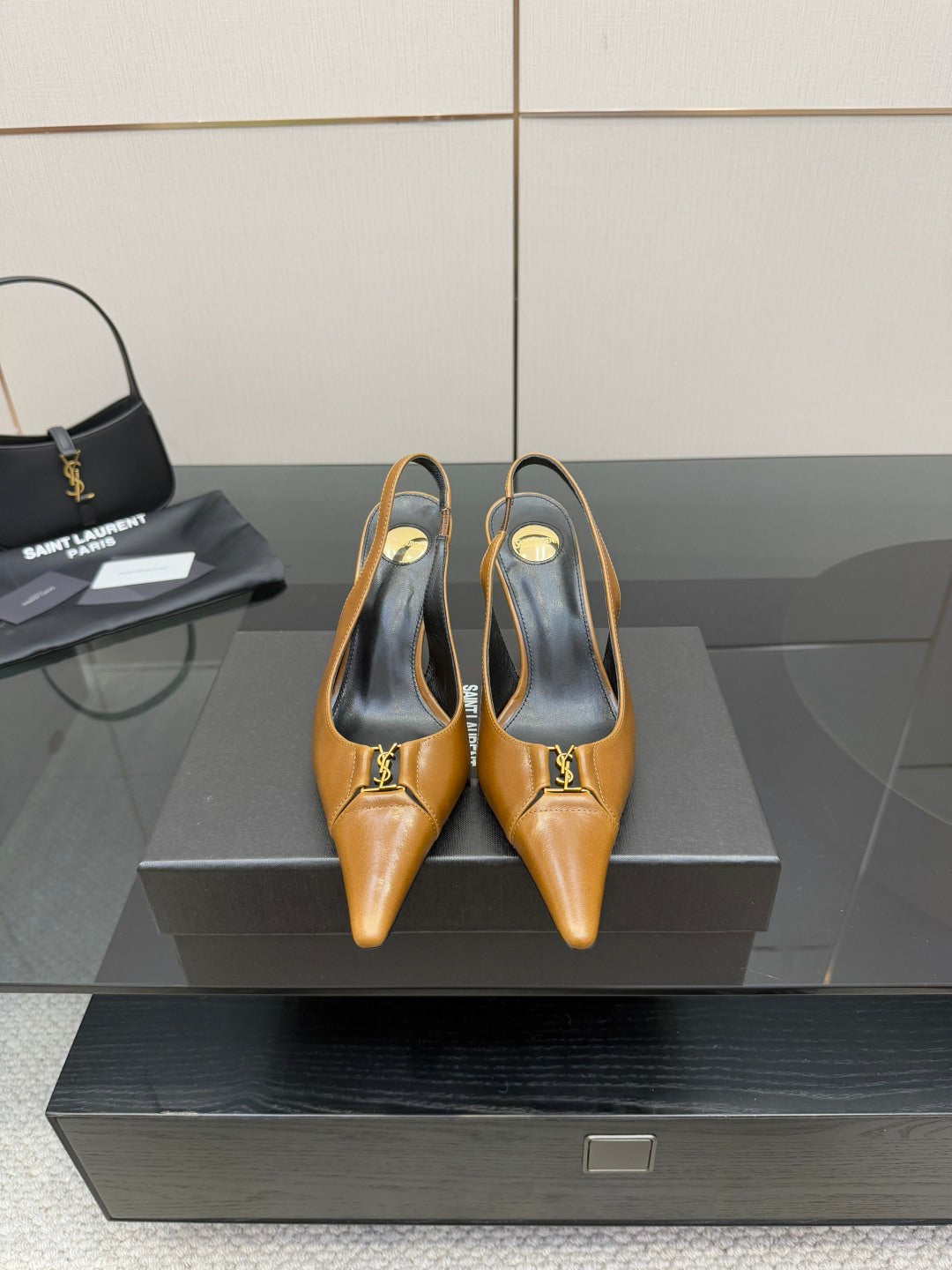 YSL ladies' pointed-toe high heels in tan, with slim stiletto heel and strap