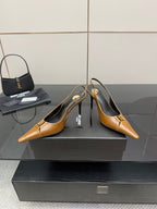 YSL ladies' tan pointed-toe high heels, front 3/4 view with slingback strap