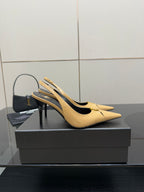 YSL beige patent slingback heels on box, pointed toe and slim stiletto heel