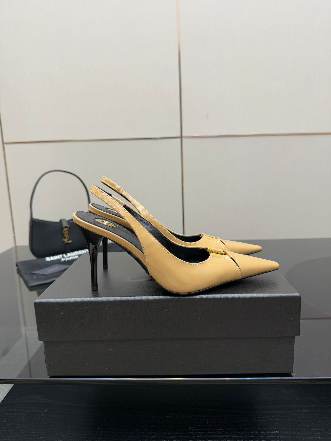 YSL beige patent slingback heels on box, pointed toe and slim stiletto heel