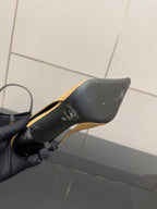 YSL beige patent slingback heel sole and heel, logo detail on outsole