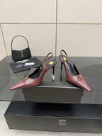 Burgundy women’s slingback pointed-toe heels with slim high heel and gold logo
