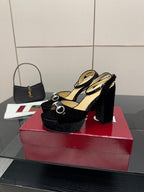 Black velvet platform heeled sandals with silver ring buckle straps